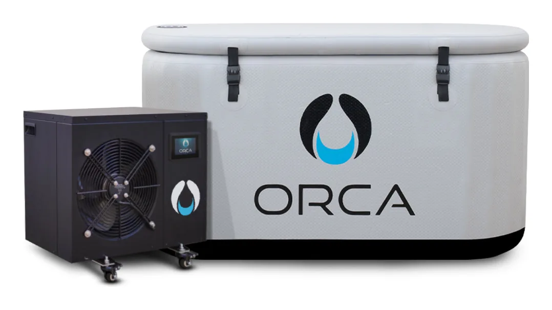 ORCA Migaloo inflatable tub in light grey with its buckled cover, beside the larger black 1 HP chiller, from the maker.