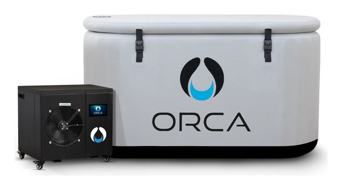 ORCA Migaloo inflatable tub in light grey with its buckled cover, beside the black 3/4 HP chiller, from the maker.