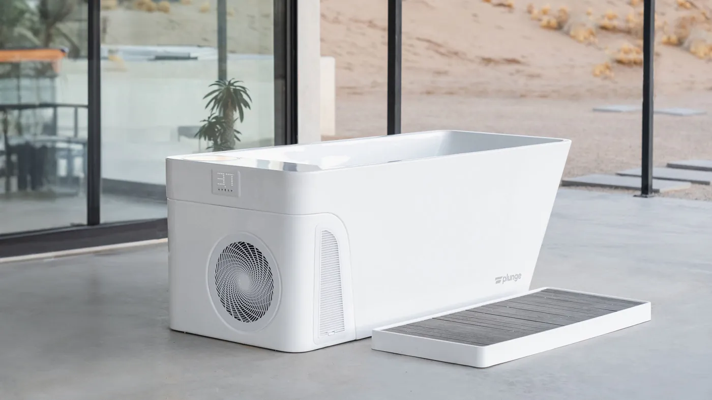 Plunge All-In Commercial in white on a concrete floor, with a Plunge Basin in front, from the maker.